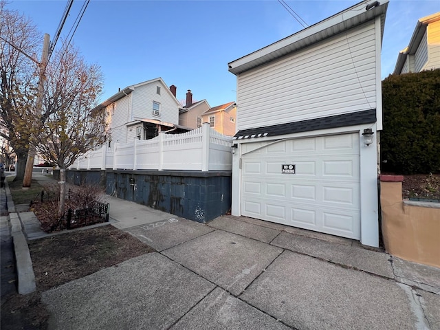 view of home's exterior with a garage