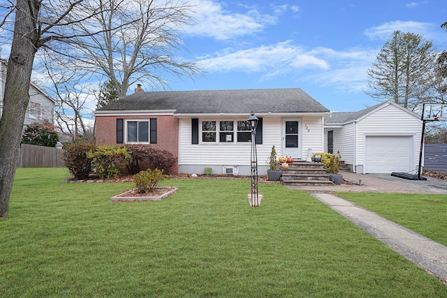 view of front of house featuring a front lawn and a garage