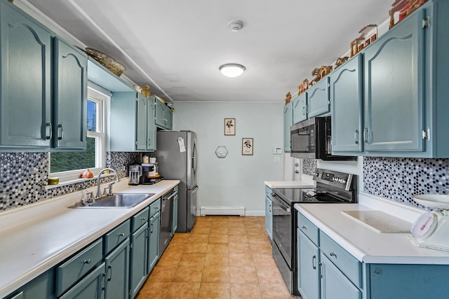 kitchen with baseboard heating, tasteful backsplash, sink, and stainless steel appliances