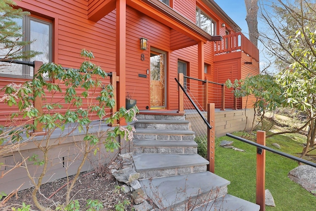 doorway to property with a balcony