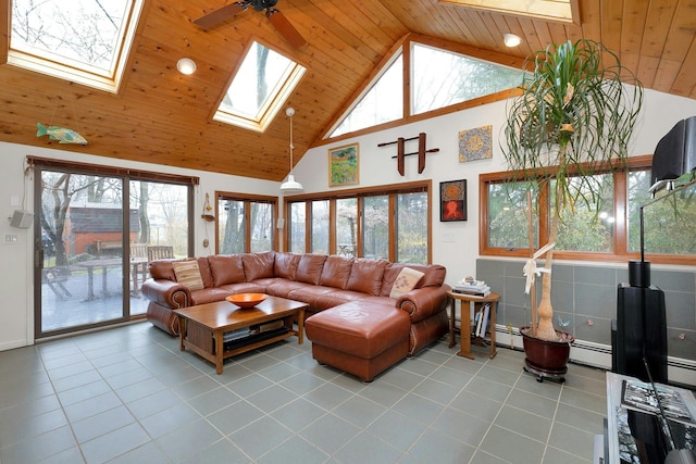 living room with light tile patterned floors, a skylight, wooden ceiling, and high vaulted ceiling