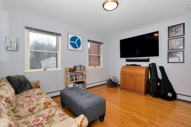 living room featuring hardwood / wood-style flooring and a baseboard radiator