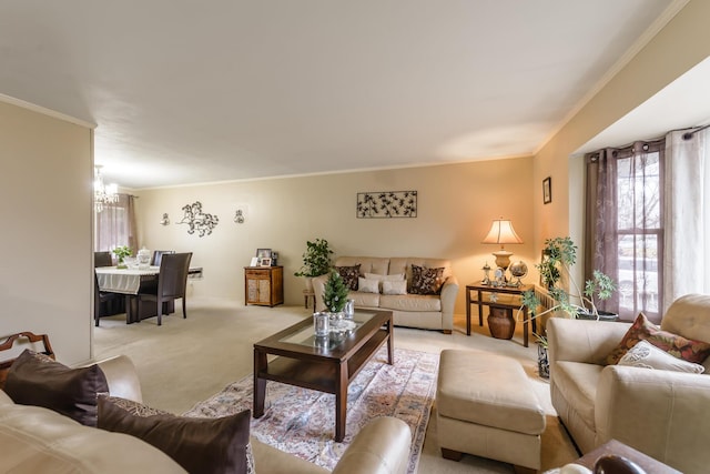 living room with crown molding, light colored carpet, and a notable chandelier