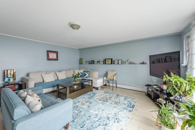 living room featuring light wood-type flooring and baseboard heating