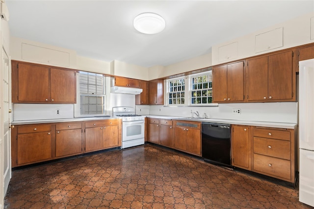 kitchen with white appliances and sink