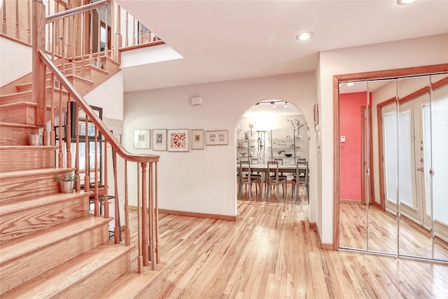 foyer with wood-type flooring