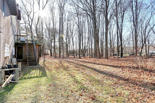 view of yard with a deck