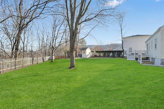 view of yard with a storage shed