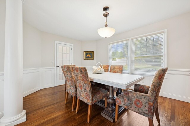 dining area with dark wood-type flooring