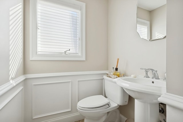 bathroom with toilet and sink