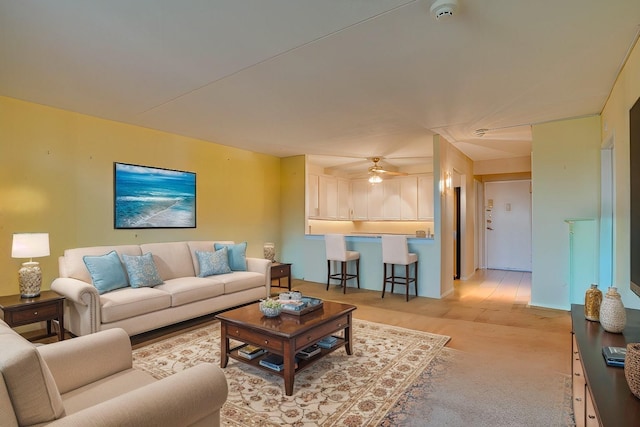 living room with ceiling fan