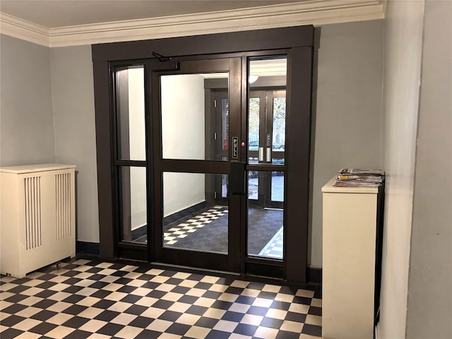 doorway to outside with ornamental molding, radiator heating unit, and french doors