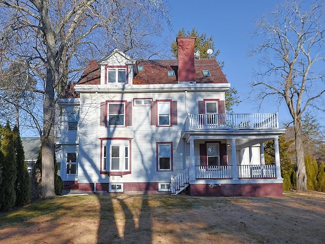 exterior space with a balcony and covered porch