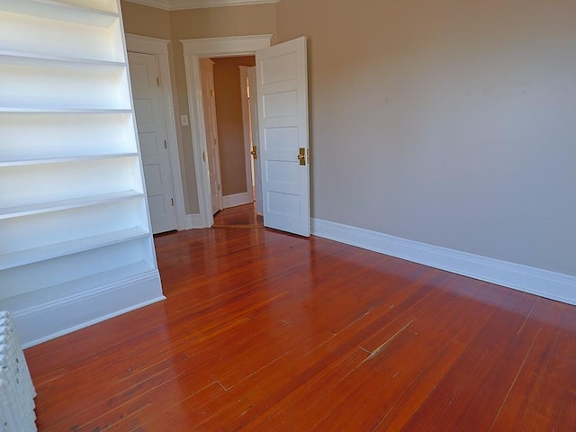 empty room featuring hardwood / wood-style floors