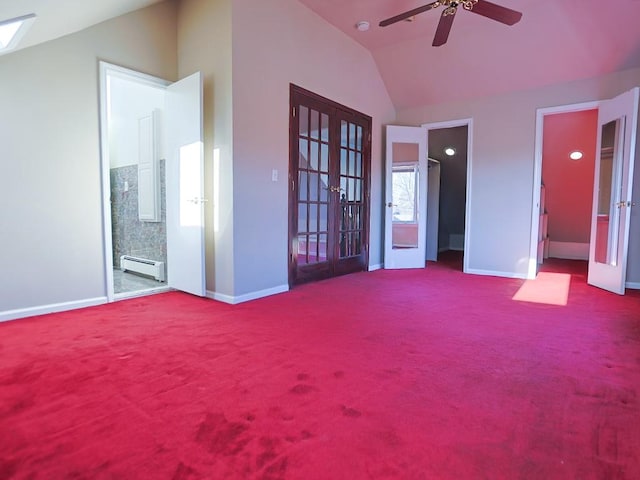 interior space featuring connected bathroom, french doors, a baseboard radiator, lofted ceiling, and carpet