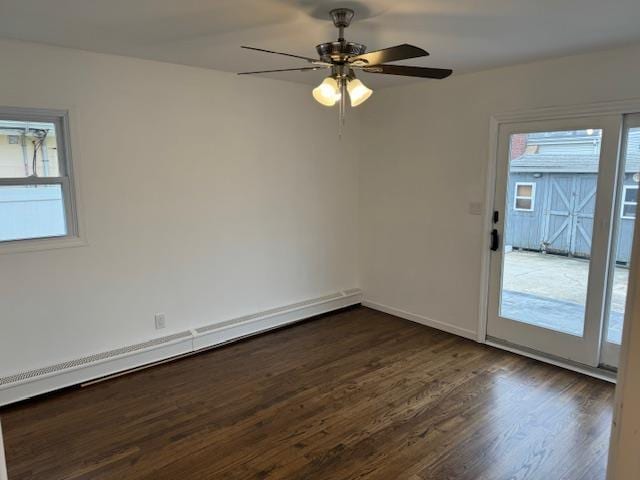 unfurnished room with dark hardwood / wood-style floors, ceiling fan, and a baseboard radiator