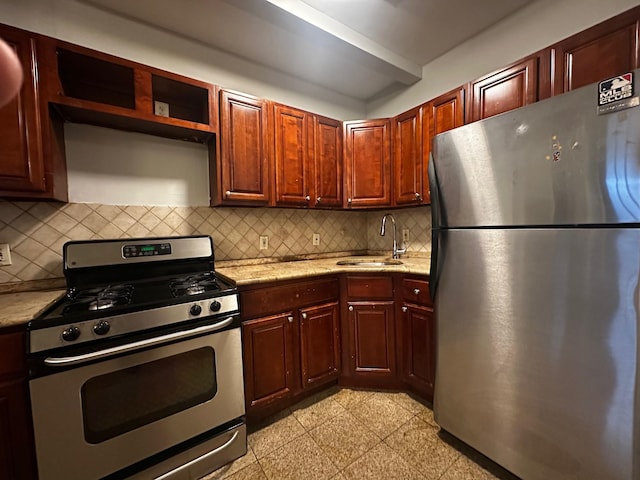 kitchen with decorative backsplash, sink, and stainless steel appliances