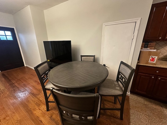 dining room with light hardwood / wood-style floors