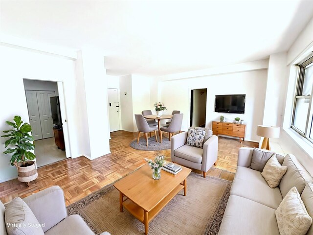 living room with parquet flooring