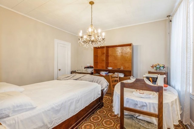 bedroom with a chandelier, multiple windows, and ornamental molding