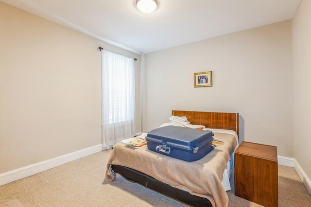 bedroom featuring carpet