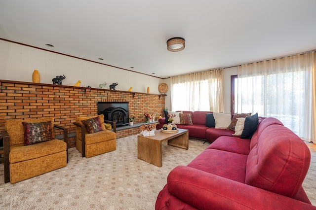 carpeted living room featuring a wood stove