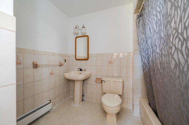 bathroom with shower / tub combo with curtain, a baseboard heating unit, tile walls, tile patterned flooring, and toilet