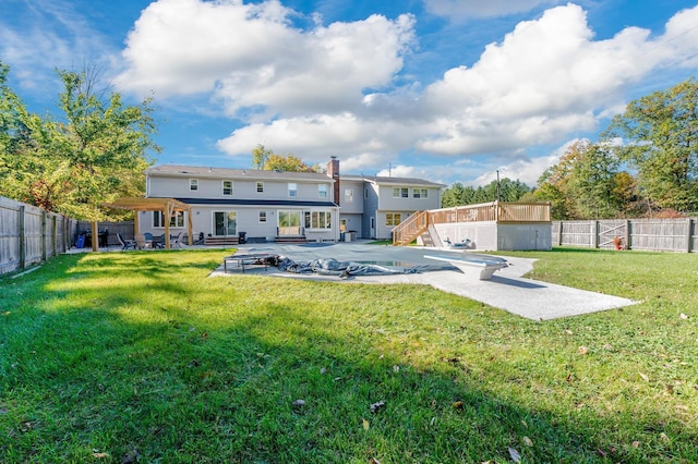 151 Burrows Ln, Blauvelt, NY 10913 - rear view of house with a fenced backyard, a patio, and a chimney