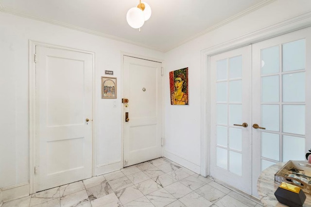 entryway featuring crown molding and french doors