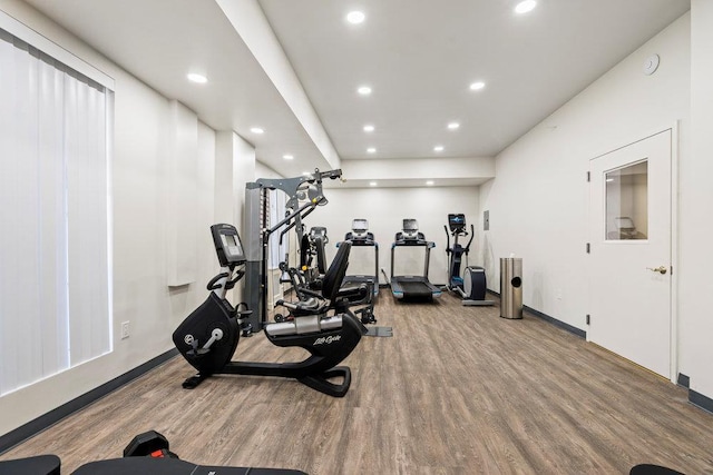 workout room with wood-type flooring