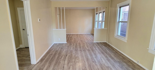 hall with light wood-type flooring