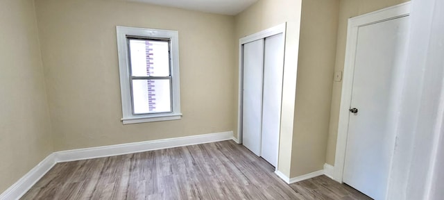 unfurnished bedroom featuring light hardwood / wood-style flooring