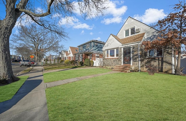 view of front of home featuring a front yard