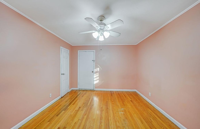 spare room with ceiling fan, light hardwood / wood-style flooring, and ornamental molding