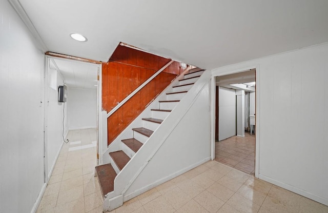 stairway with crown molding