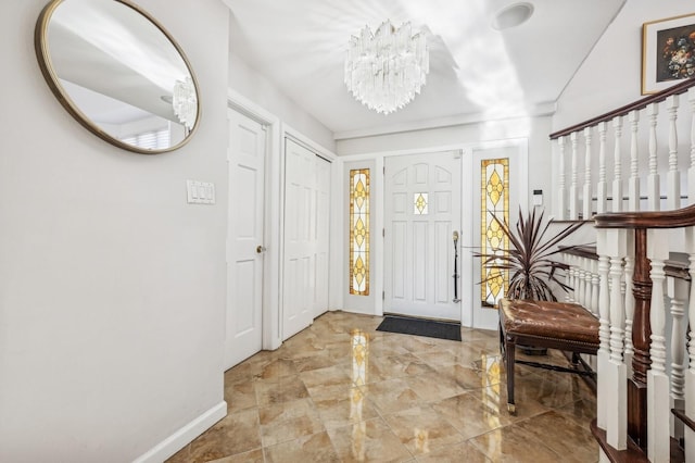 foyer featuring a notable chandelier