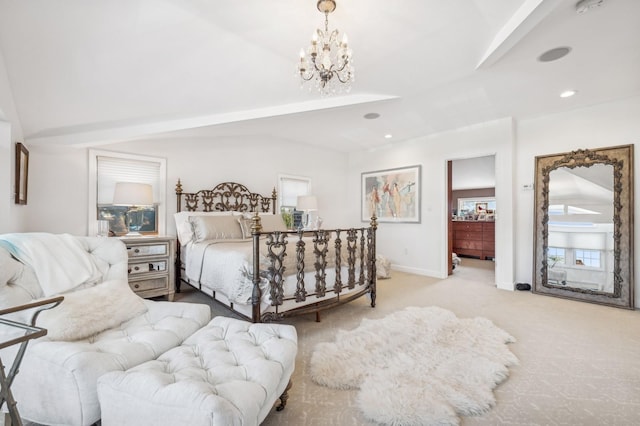 carpeted bedroom with an inviting chandelier and vaulted ceiling