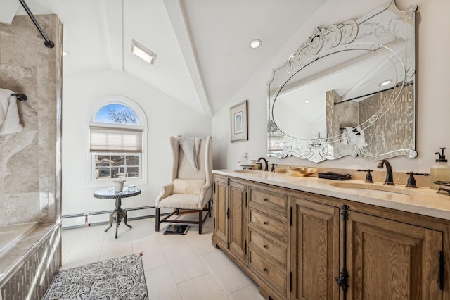 bathroom featuring vaulted ceiling, a baseboard heating unit, vanity, and tile patterned floors