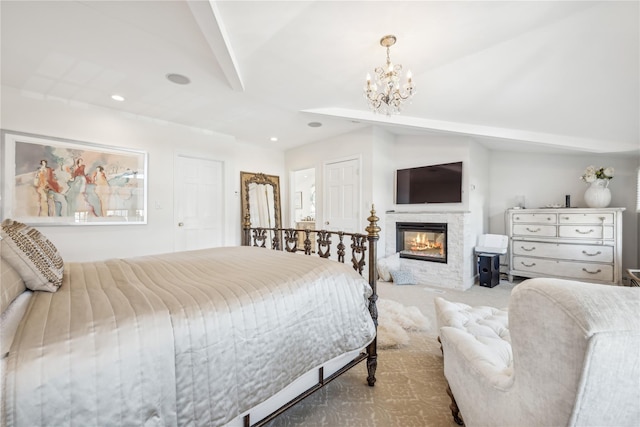 carpeted bedroom with a notable chandelier