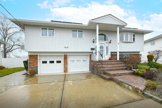 split foyer home featuring a garage