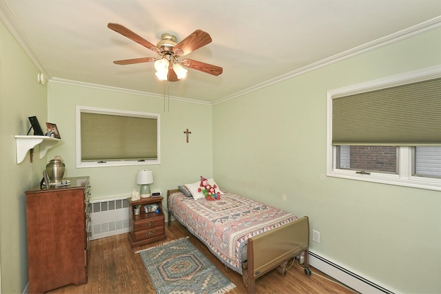 bedroom with radiator, ceiling fan, dark wood-type flooring, a baseboard radiator, and ornamental molding