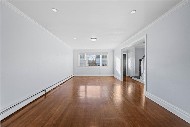 unfurnished living room featuring baseboard heating, crown molding, and dark wood-type flooring