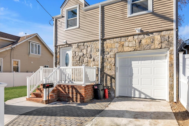 exterior space with a garage