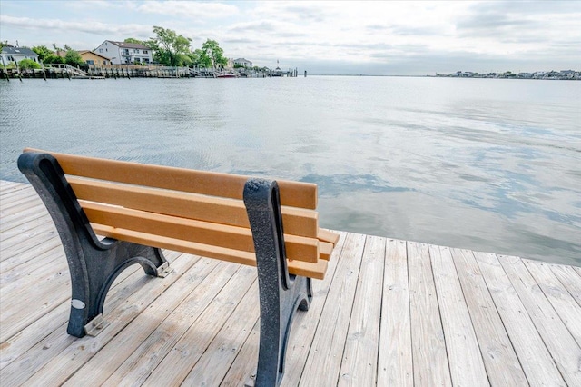 dock area featuring a water view