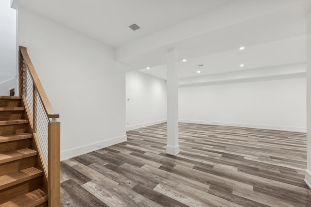 basement with wood-type flooring