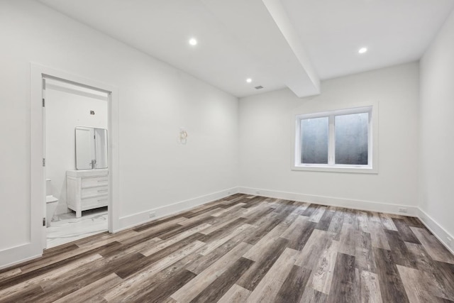 empty room featuring hardwood / wood-style floors