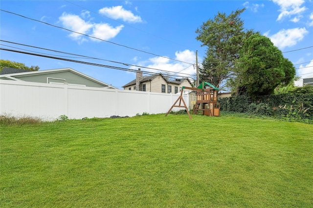 view of yard with a playground