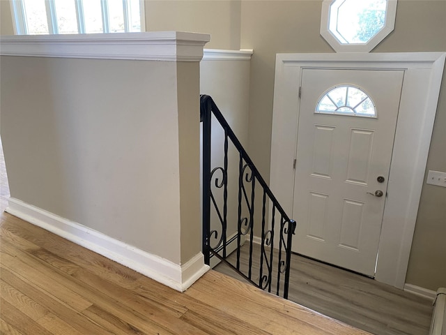 entrance foyer with hardwood / wood-style floors