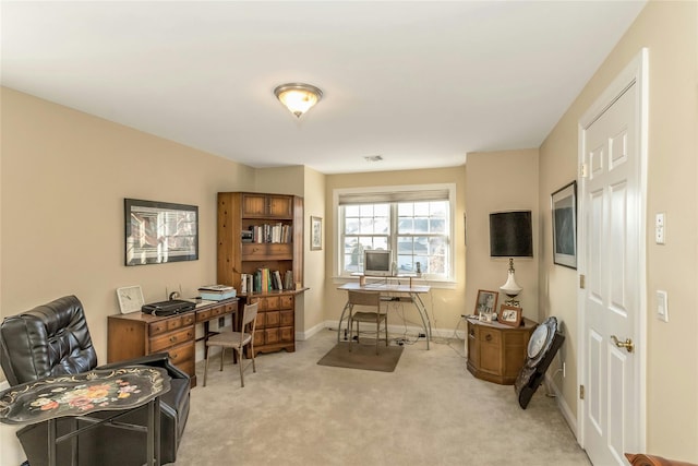 office space with light colored carpet