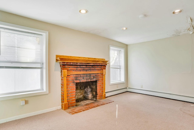 unfurnished living room featuring light colored carpet and a brick fireplace